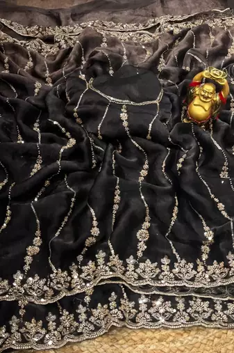 Black color elegant space silk fabric rich looks embroidered saree