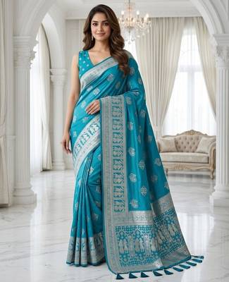 Teal color lichi silk fabric woven silver jari designer saree 1