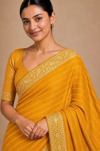 Yellow color smart chiffon designer wevon jacquard designer partywear saree