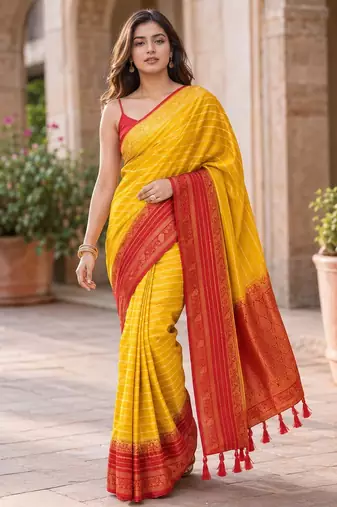 Yellow color designer wevon jacquard designer crepe fabric traditional rich saree