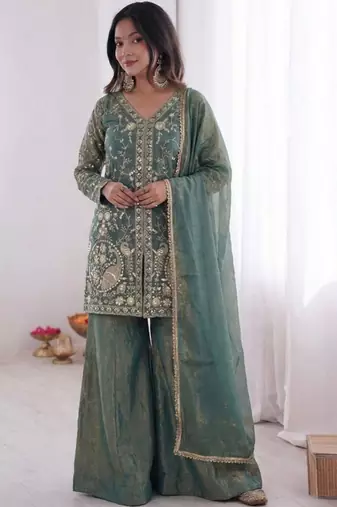 Green color jam cotton fabric beautiful festive wear girlie suit