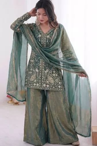 Green color jam cotton fabric beautiful festive wear girlie suit