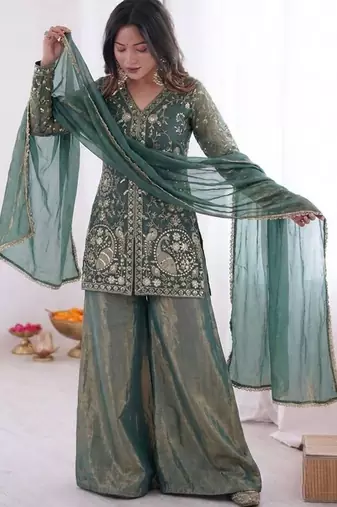 Green color jam cotton fabric beautiful festive wear girlie suit