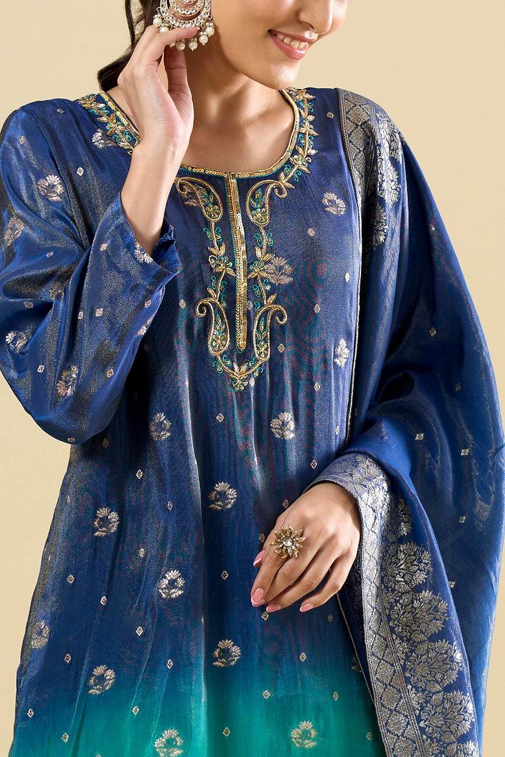 Green color silk fabric designer embroidered ethnic partywear suit for girls