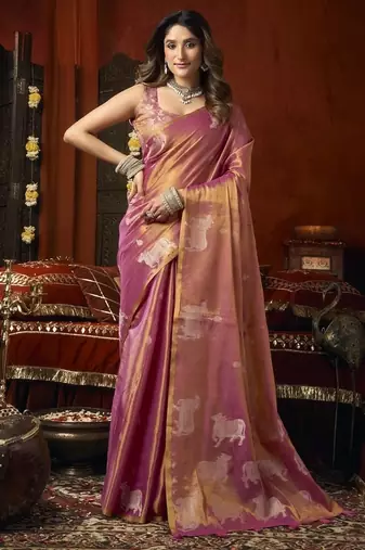 Peach heavy tissue with allover cow butta & fancy tassels saree