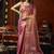 Peach heavy tissue with allover cow butta & fancy tassels saree