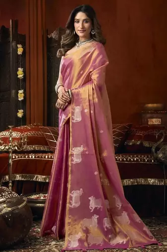 Peach heavy tissue with allover cow butta & fancy tassels saree