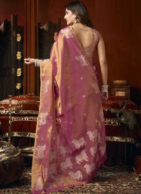 Peach heavy tissue with allover cow butta & fancy tassels saree 3