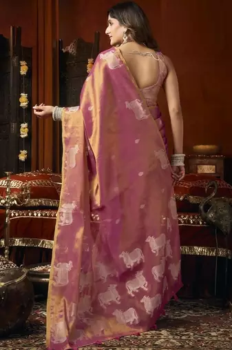 Peach heavy tissue with allover cow butta & fancy tassels saree