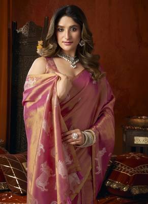 Peach heavy tissue with allover cow butta & fancy tassels saree 4