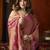 Peach heavy tissue with allover cow butta & fancy tassels saree