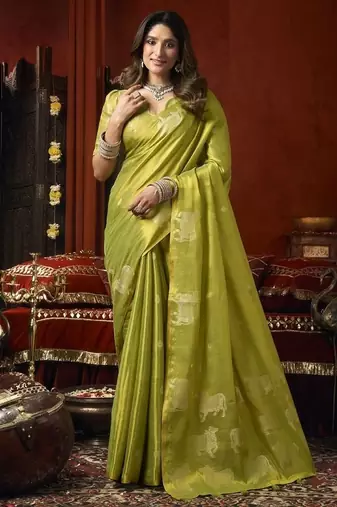 Olive heavy tissue with allover cow butta & fancy tassels saree