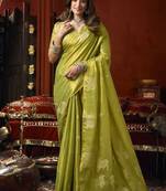 Olive heavy tissue with allover cow butta & fancy tassels saree