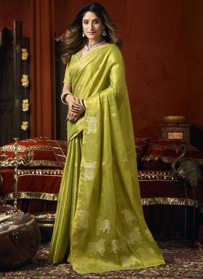 Olive heavy tissue with allover cow butta & fancy tassels saree 2