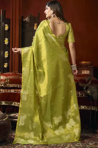 Olive heavy tissue with allover cow butta & fancy tassels saree