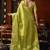 Olive heavy tissue with allover cow butta & fancy tassels saree