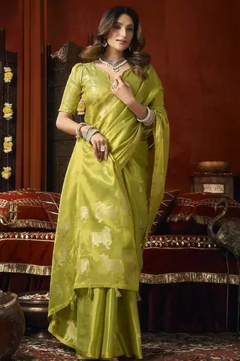Olive heavy tissue with allover cow butta & fancy tassels saree