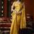 Golden heavy tissue with allover cow butta & fancy tassels saree