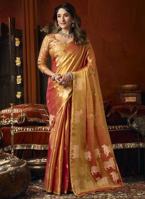 Orange green heavy tissue with allover cow butta & fancy tassels saree 1