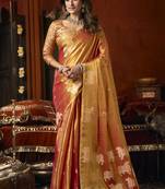 Orange green heavy tissue with allover cow butta & fancy tassels saree