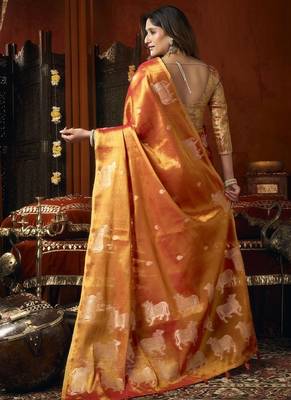 Orange green heavy tissue with allover cow butta & fancy tassels saree 2