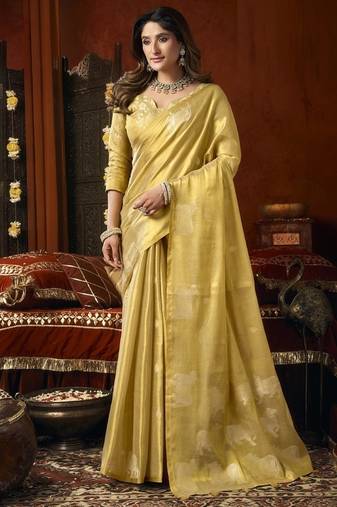 Cream green heavy tissue with allover cow butta & fancy tassels saree