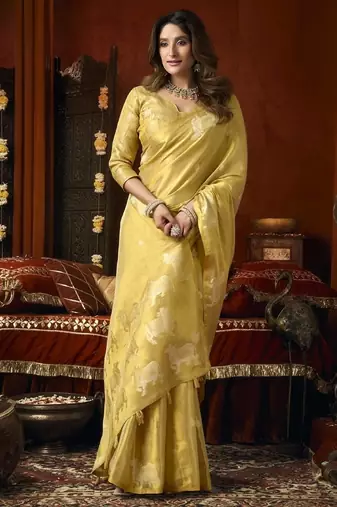 Cream green heavy tissue with allover cow butta & fancy tassels saree