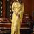 Cream green heavy tissue with allover cow butta & fancy tassels saree