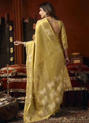 Cream green heavy tissue with allover cow butta & fancy tassels saree 3