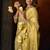 Cream green heavy tissue with allover cow butta & fancy tassels saree