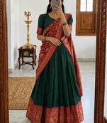  Green Traditional Lehenga Choli Set Featuring Intricate Purple and Gold Zari Detailing