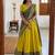  Yellow Traditional Lehenga Choli Set Featuring Intricate Purple and Gold Zari Detailing
