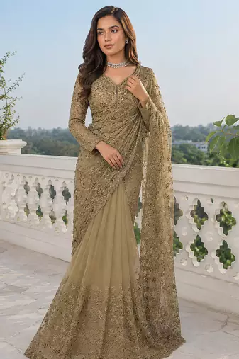 Luxury antique gold net saree with heavy embroidery for wedding reception festive wear