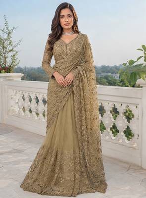 Luxury antique gold net saree with heavy embroidery for wedding reception festive wear 2