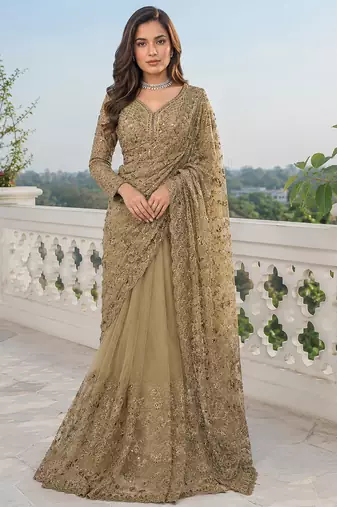 Luxury antique gold net saree with heavy embroidery for wedding reception festive wear