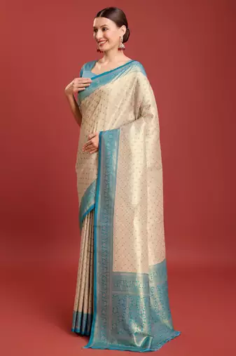 Off white sky kanjivaram silk banarasi jacuard work saree with unstitched blouse piece