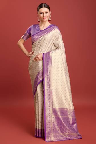 Off white sky banarasi silk blend jacuard work saree with unstitched blouse piece