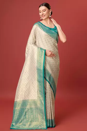 Off white sky kanjivaram silk banarasi jacuard work saree with unstitched blouse piece