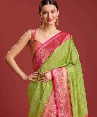 parrot green silk blend banarasi jacuard work saree with unstitched blouse piece 4
