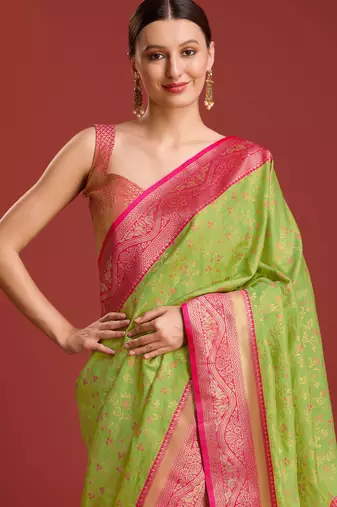 parrot green silk blend banarasi jacuard work saree with unstitched blouse piece