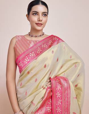 cream silk blend banarasi jacuard work saree with unstitched blouse piece 4