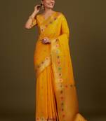 yeloow silk blend banarasi jacuard work saree with unstitched blouse piece