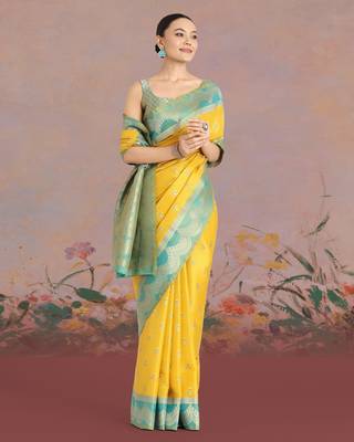 yellow silk blend banarasi jacuard work saree with unstitched blouse piece 2