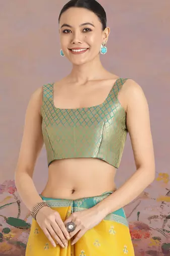 yellow silk blend banarasi jacuard work saree with unstitched blouse piece
