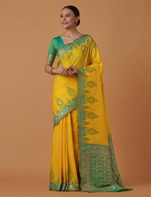 yellow silk blend banarasi jacuard work saree with unstitched blouse piece 1