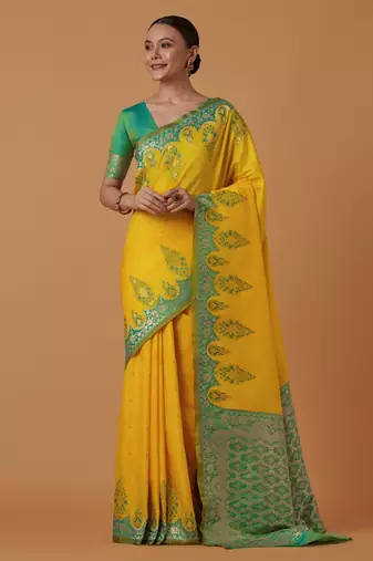 yellow silk blend banarasi jacuard work saree with unstitched blouse piece