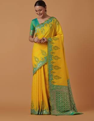 yellow silk blend banarasi jacuard work saree with unstitched blouse piece 2
