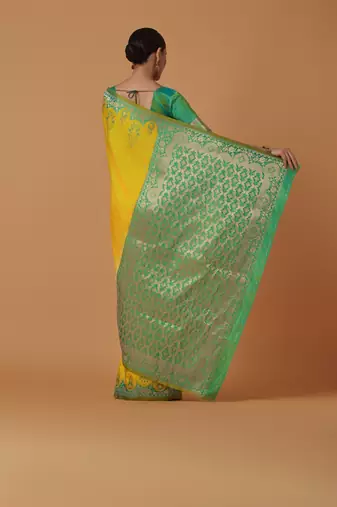 yellow silk blend banarasi jacuard work saree with unstitched blouse piece