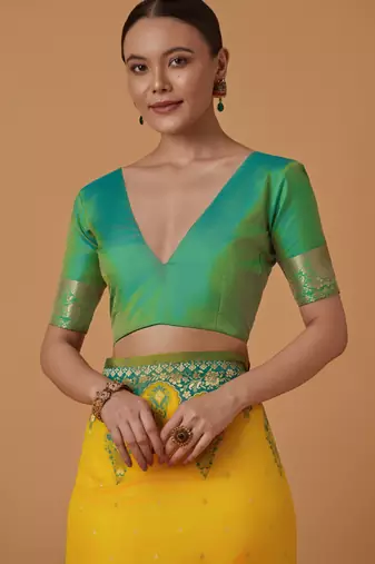 yellow silk blend banarasi jacuard work saree with unstitched blouse piece