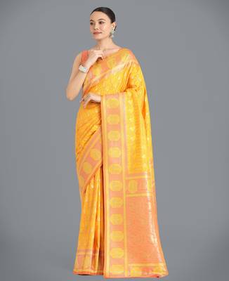 yellow silk blend banarasi jacuard work saree with unstitched blouse piece 1